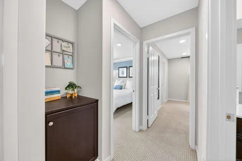 a room that has a lot of cabinets and wooden floor