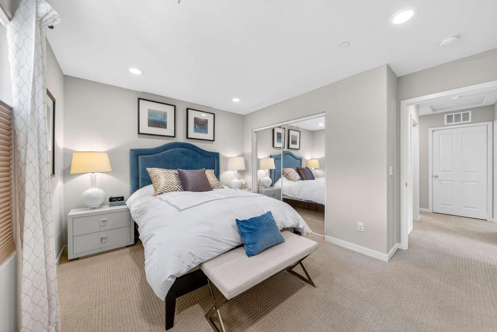 387 Mission Villas Road San Marcos, CA 92069 - Photo 32 of 45 a bedroom with a bed and a night stand