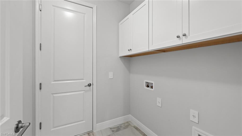 4641 Centaurus Circle Naples, FL 34120 - Photo 11 of 31 a bathroom with a sink