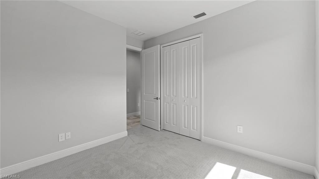 4641 Centaurus Circle Naples, FL 34120 - Photo 16 of 31 a view of an empty room