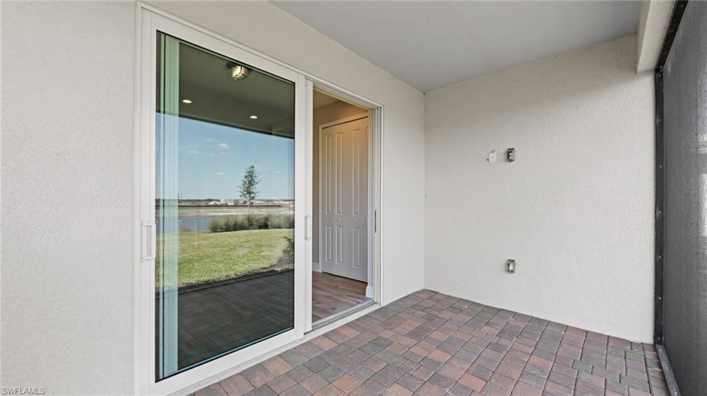 4641 Centaurus Circle Naples, FL 34120 - Photo 29 of 31 a view of kitchen with livingroom
