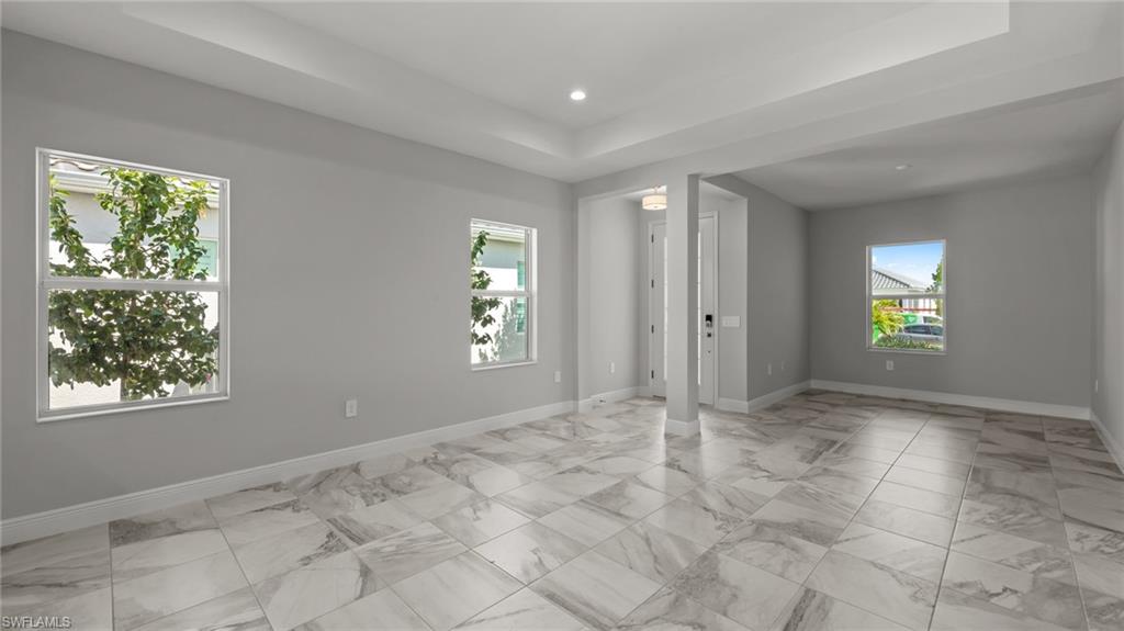 4641 Centaurus Circle Naples, FL 34120 - Photo 7 of 31 a view of an empty room with window and bathroom