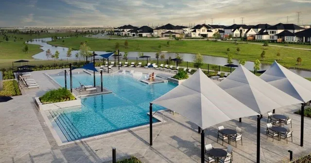 an aerial view of a house with outdoor space