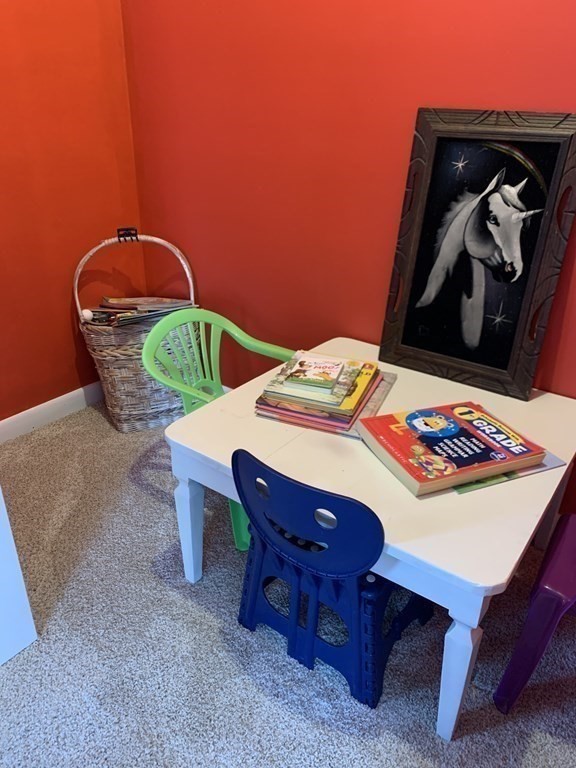 70 Driftwood Road Springfield, MA 01128 - Photo 17 of 25 a table and chairs in a room