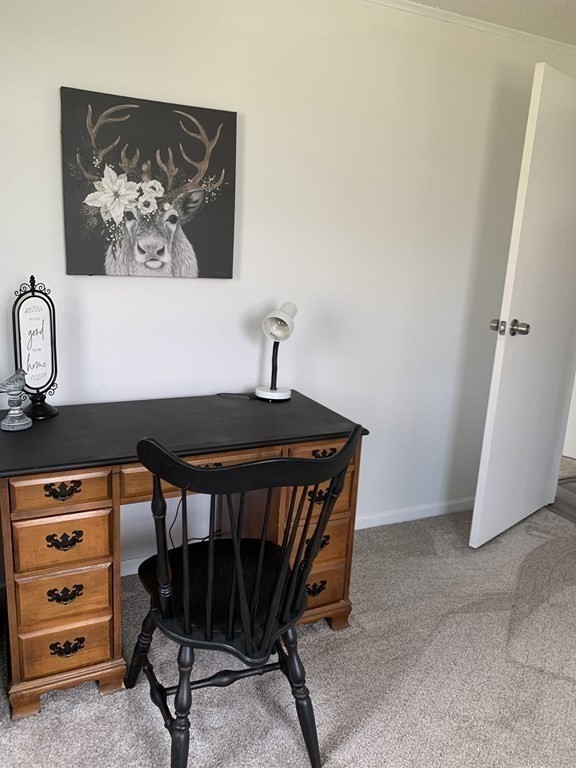 70 Driftwood Road Springfield, MA 01128 - Photo 21 of 25 a bedroom with a bed and a cabinet