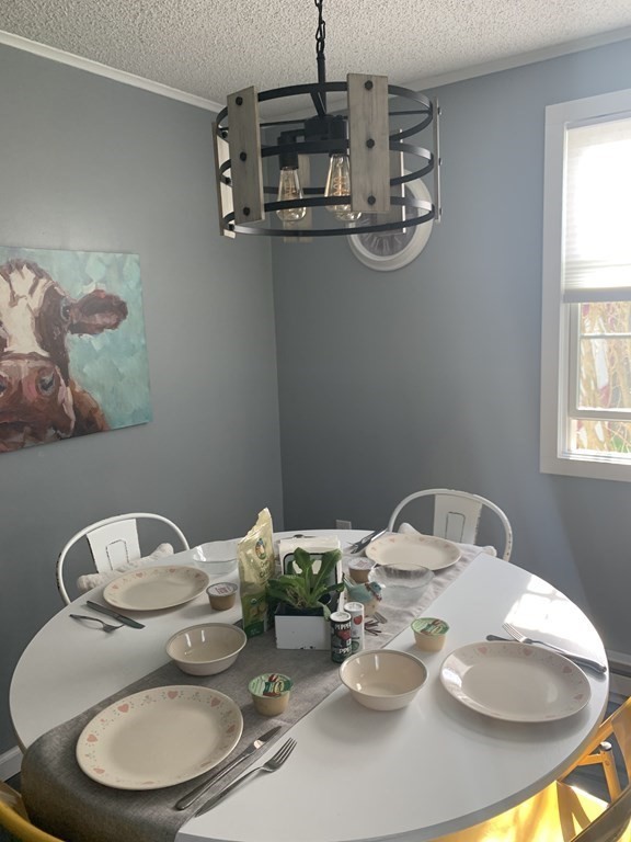 70 Driftwood Road Springfield, MA 01128 - Photo 4 of 25 a close view of dining table