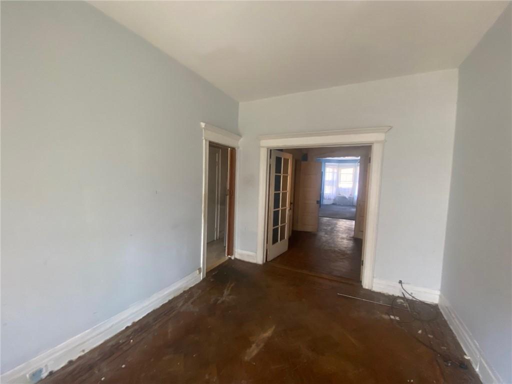 630 53rd Street Brooklyn, NY 11220 - Photo 5 of 14 a view of livingroom with hardwood floor and yard