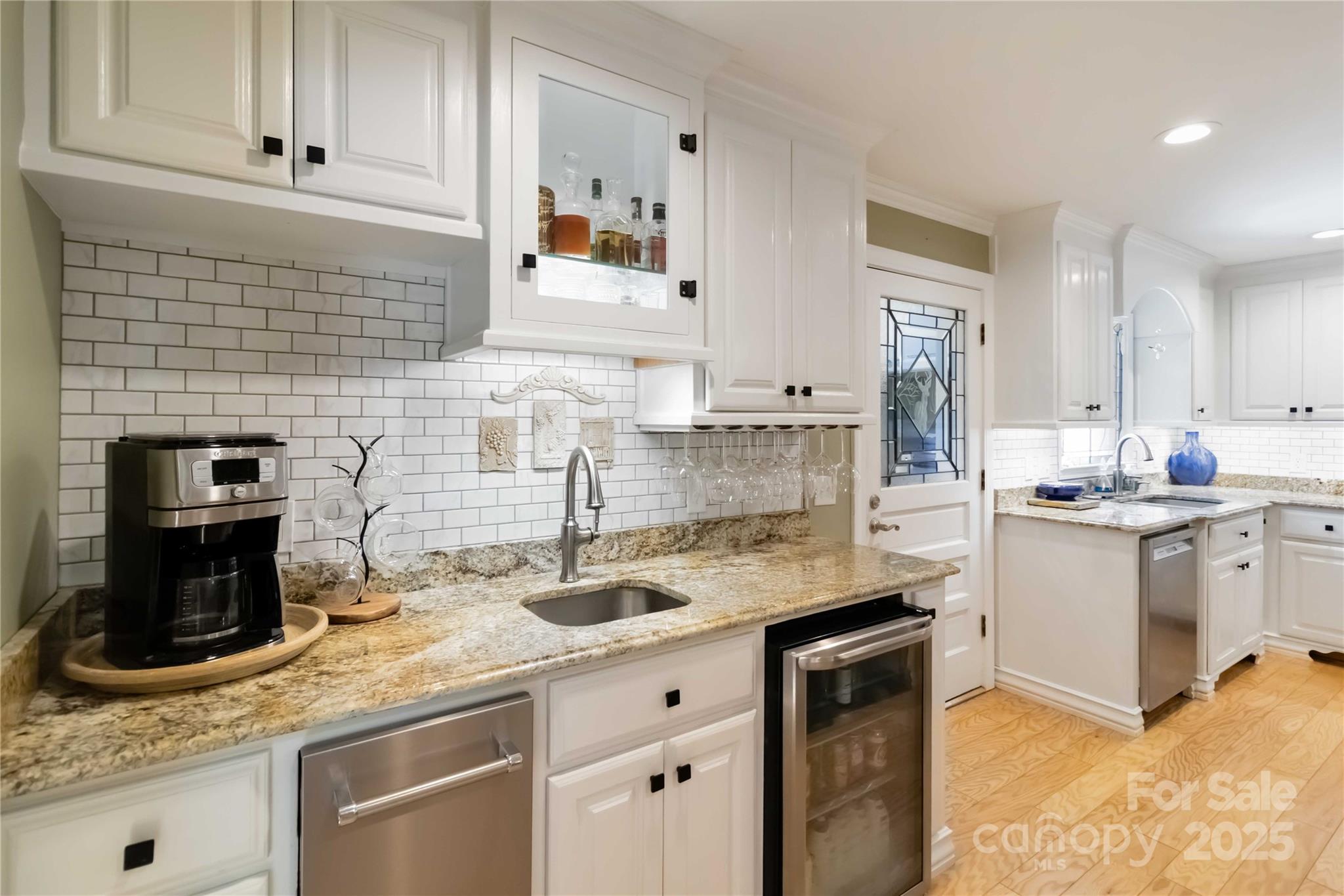 2880 Legion Road Smyrna, SC 29743 - Photo 15 of 48 a kitchen with sink stove and cabinets