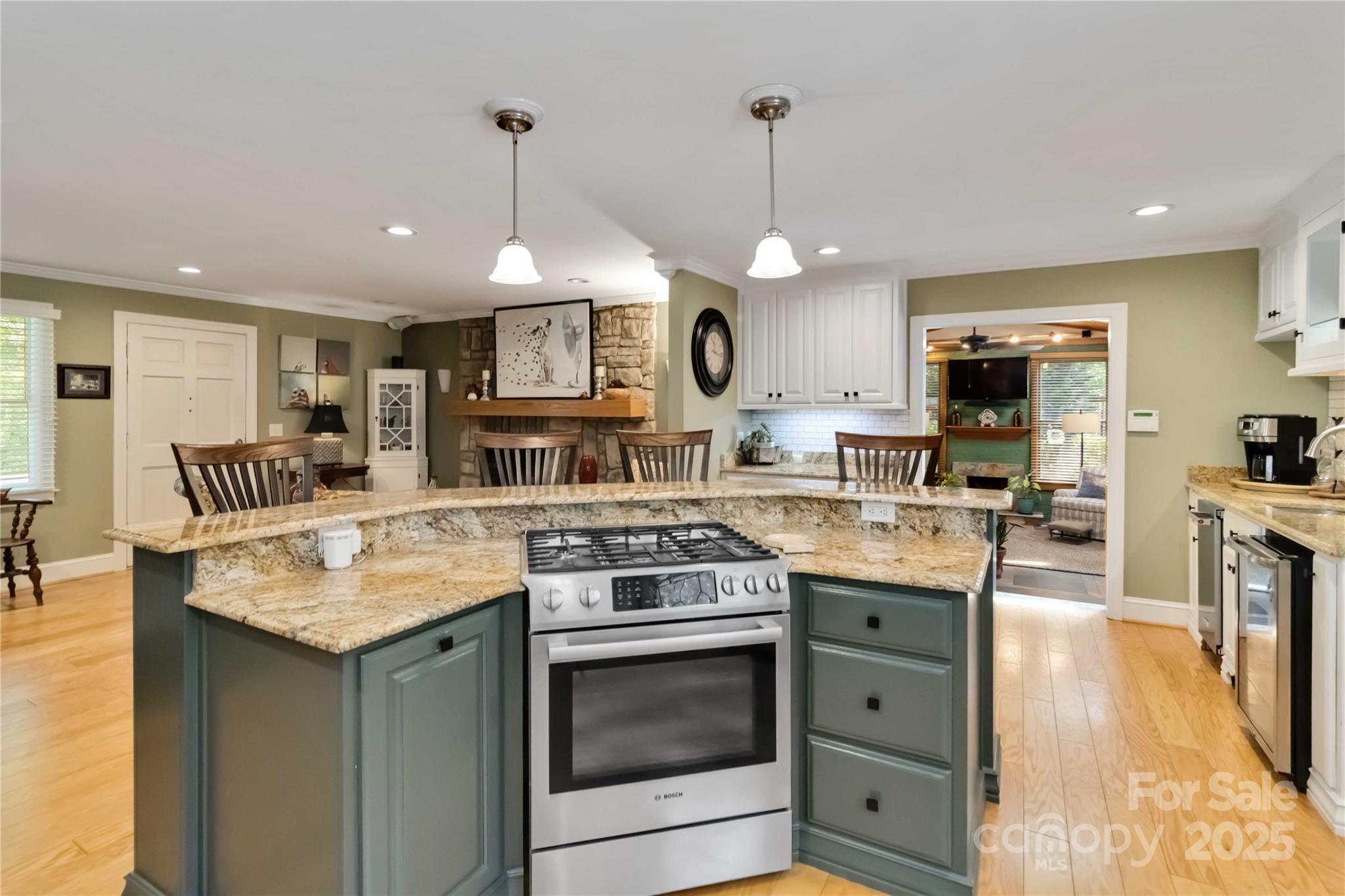 2880 Legion Road Smyrna, SC 29743 - Photo 16 of 48 a kitchen with stainless steel appliances granite countertop a stove and a sink