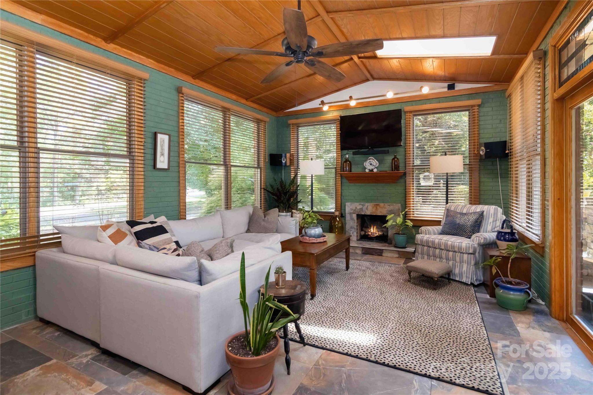 2880 Legion Road Smyrna, SC 29743 - Photo 19 of 48 a living room with fireplace furniture and a large window