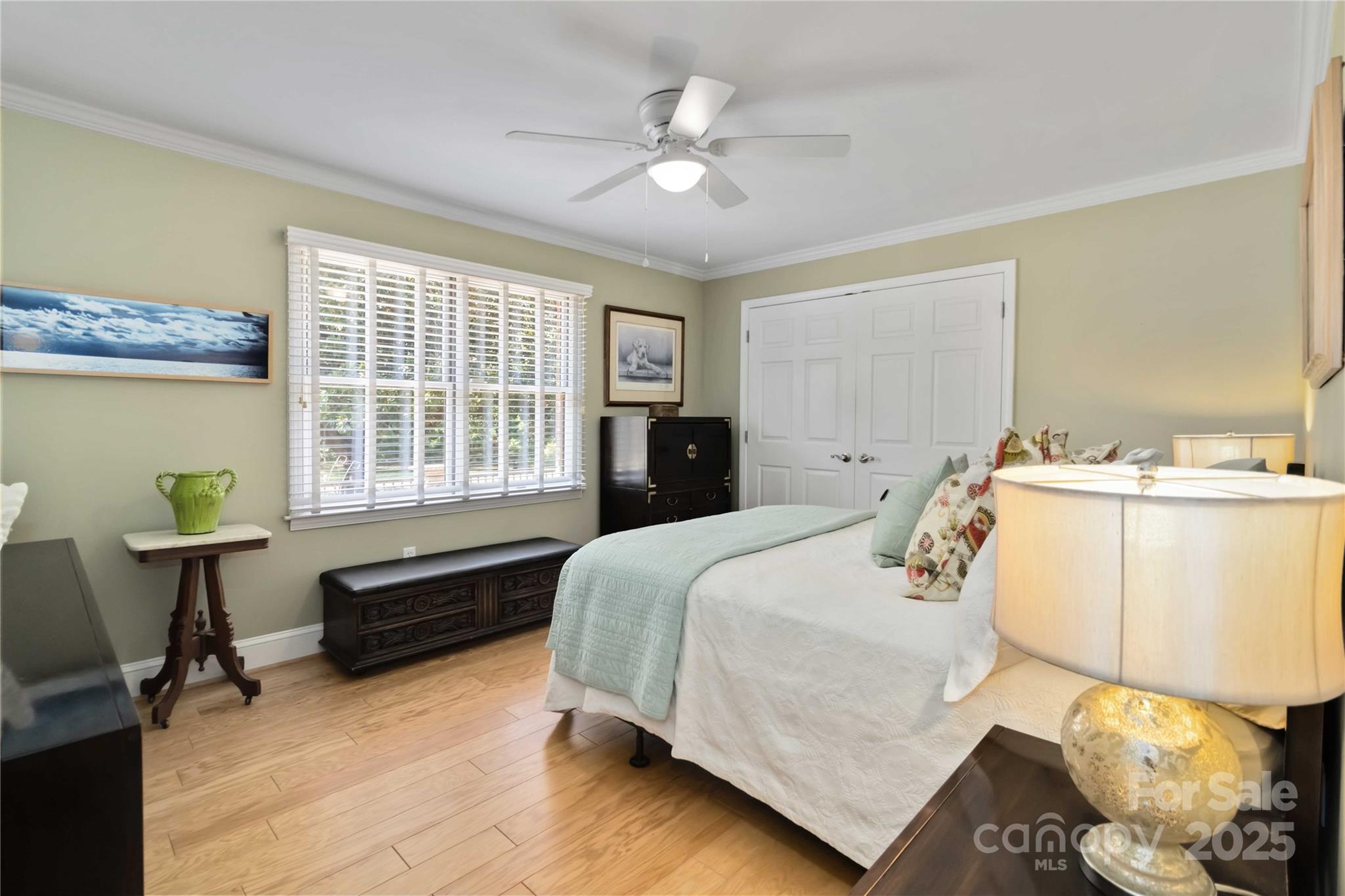 2880 Legion Road Smyrna, SC 29743 - Photo 24 of 48 a spacious bedroom with a bed and a table in it
