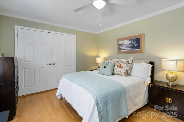 a bedroom with bed and window