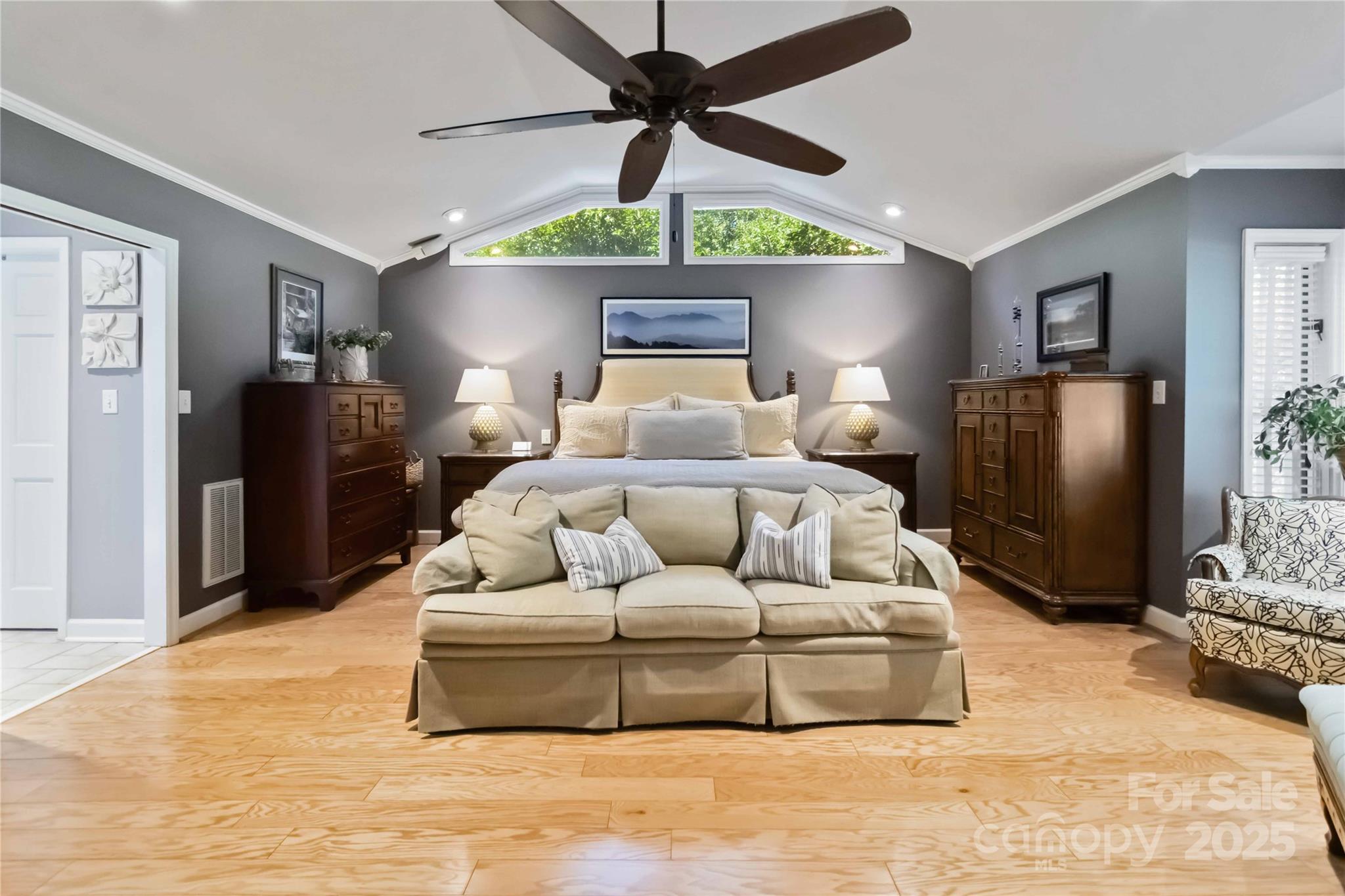 2880 Legion Road Smyrna, SC 29743 - Photo 30 of 48 a bedroom with a bed couch and ceiling fan