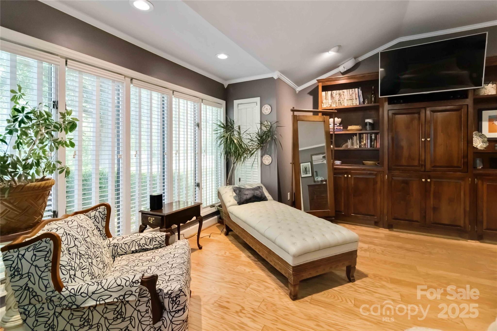 2880 Legion Road Smyrna, SC 29743 - Photo 31 of 48 a living room with furniture fireplace and flat screen tv