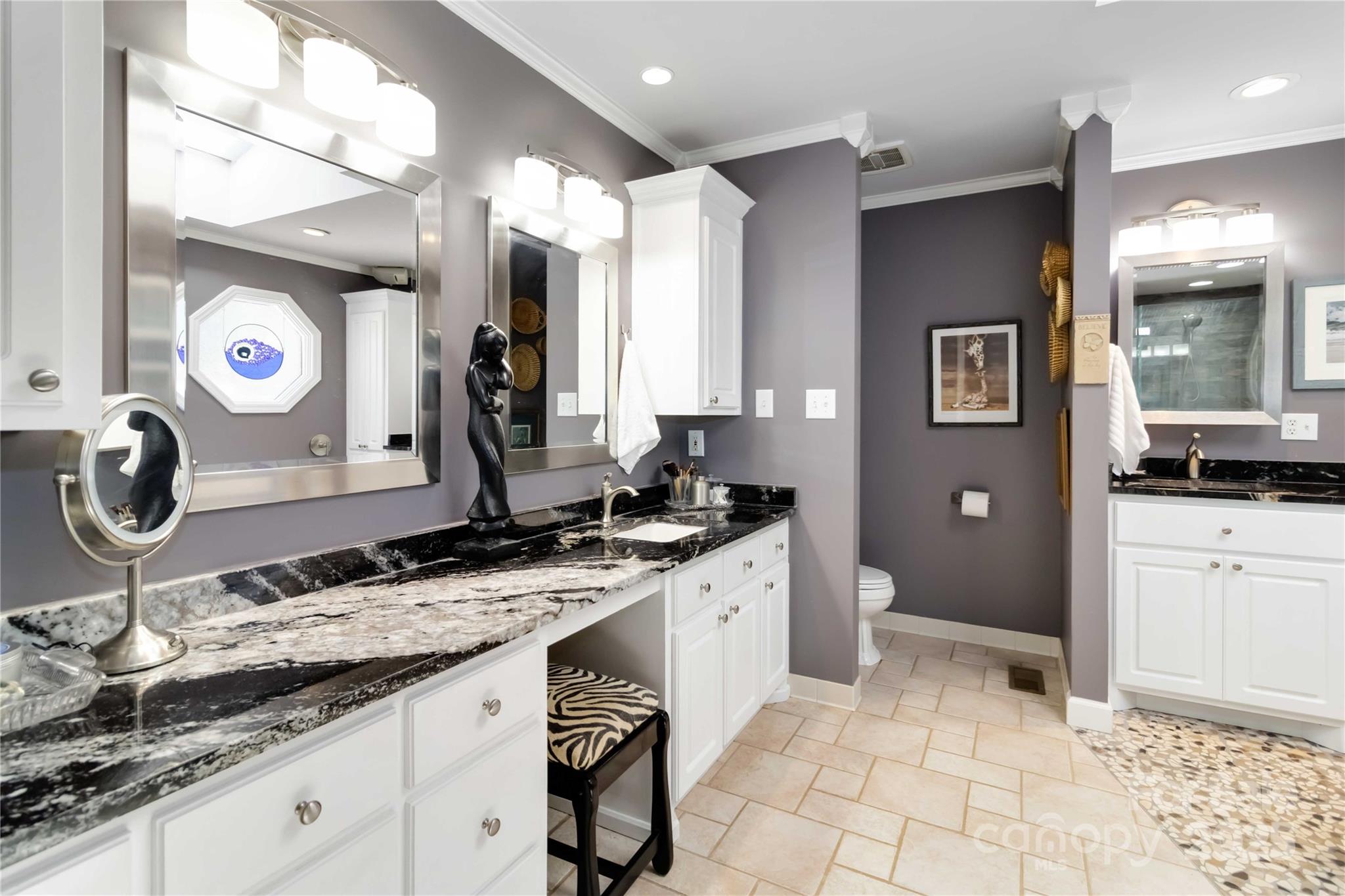 2880 Legion Road Smyrna, SC 29743 - Photo 34 of 48 a bathroom with a sink and a mirror