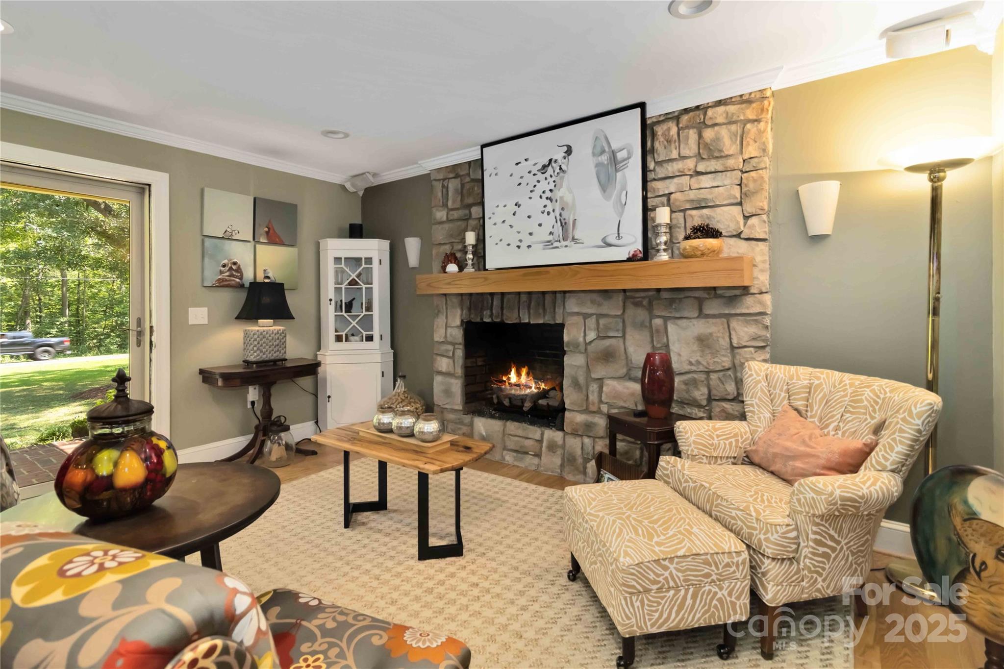 2880 Legion Road Smyrna, SC 29743 - Photo 4 of 48 a living room with furniture and a fireplace