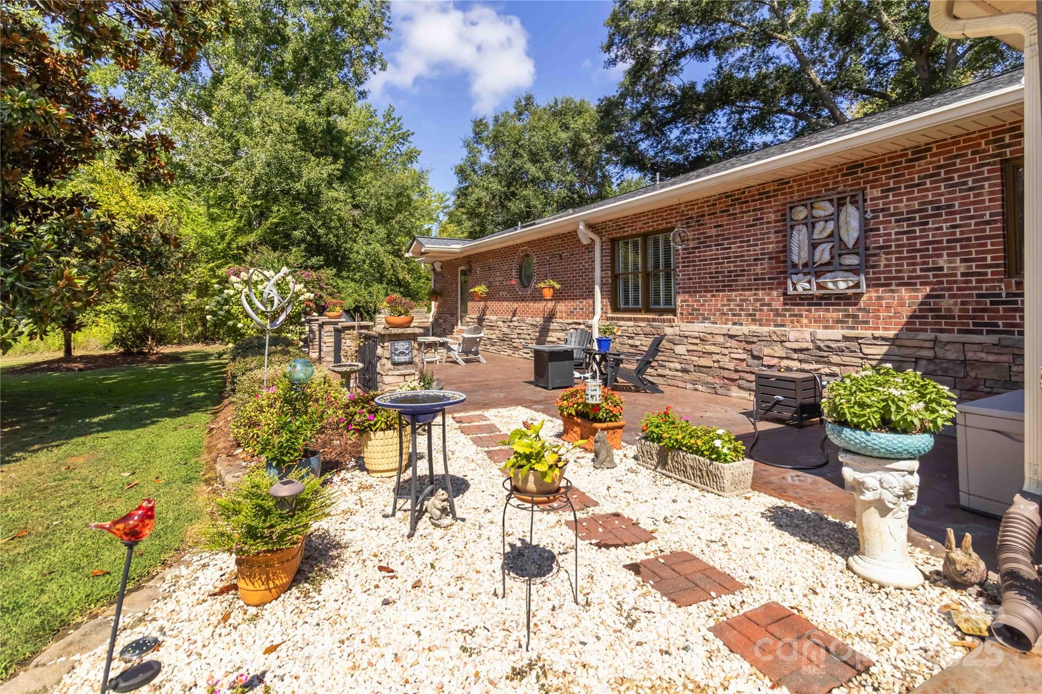 2880 Legion Road Smyrna, SC 29743 - Photo 42 of 48 a backyard of a house with yard and outdoor seating