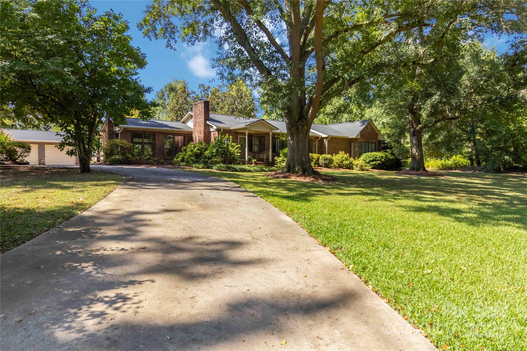 2880 Legion Road Smyrna, SC 29743 - Photo 46 of 48 a view of a swimming pool in front of the house