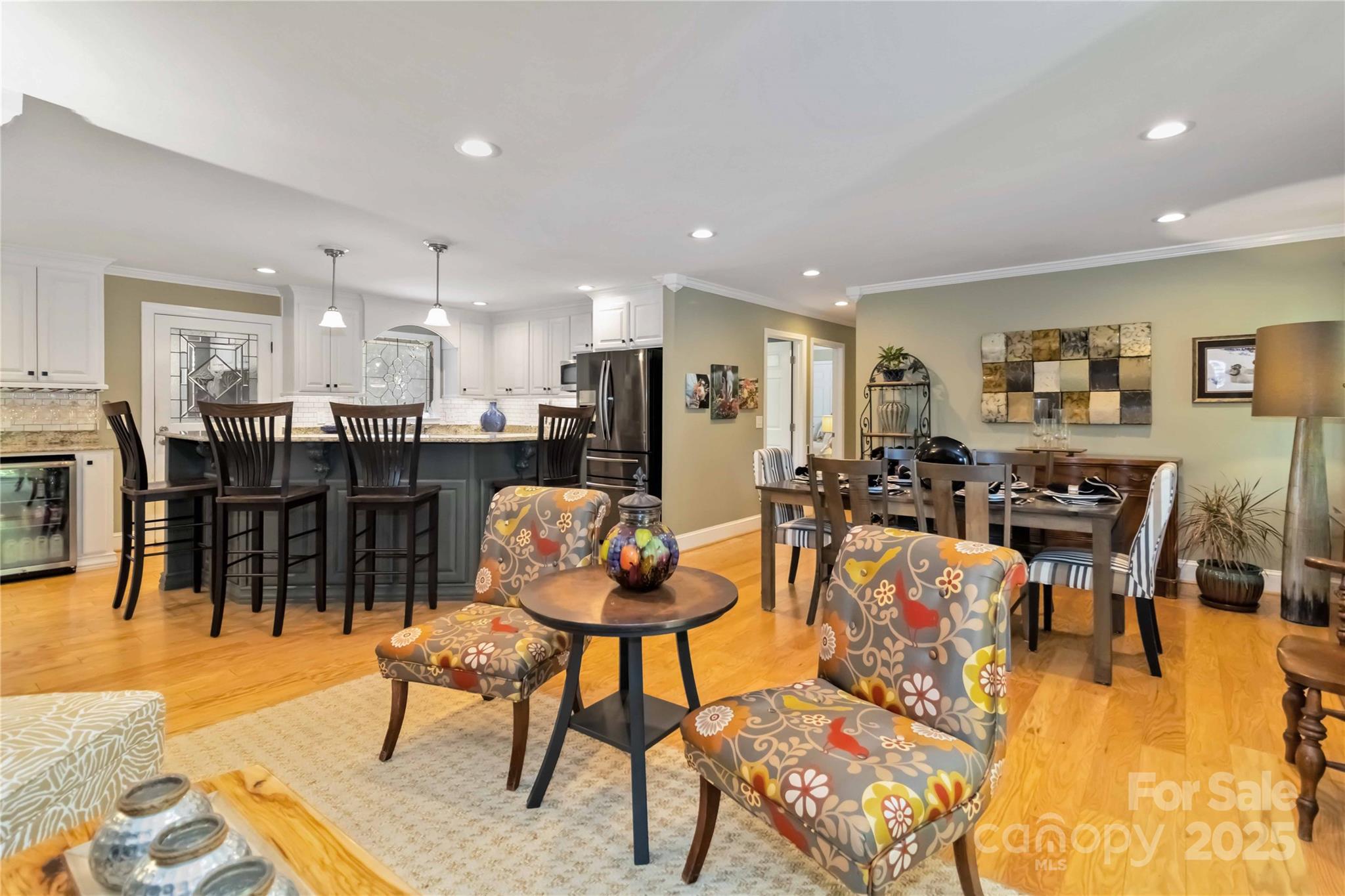 2880 Legion Road Smyrna, SC 29743 - Photo 5 of 48 a living room with dining room and kitchen view