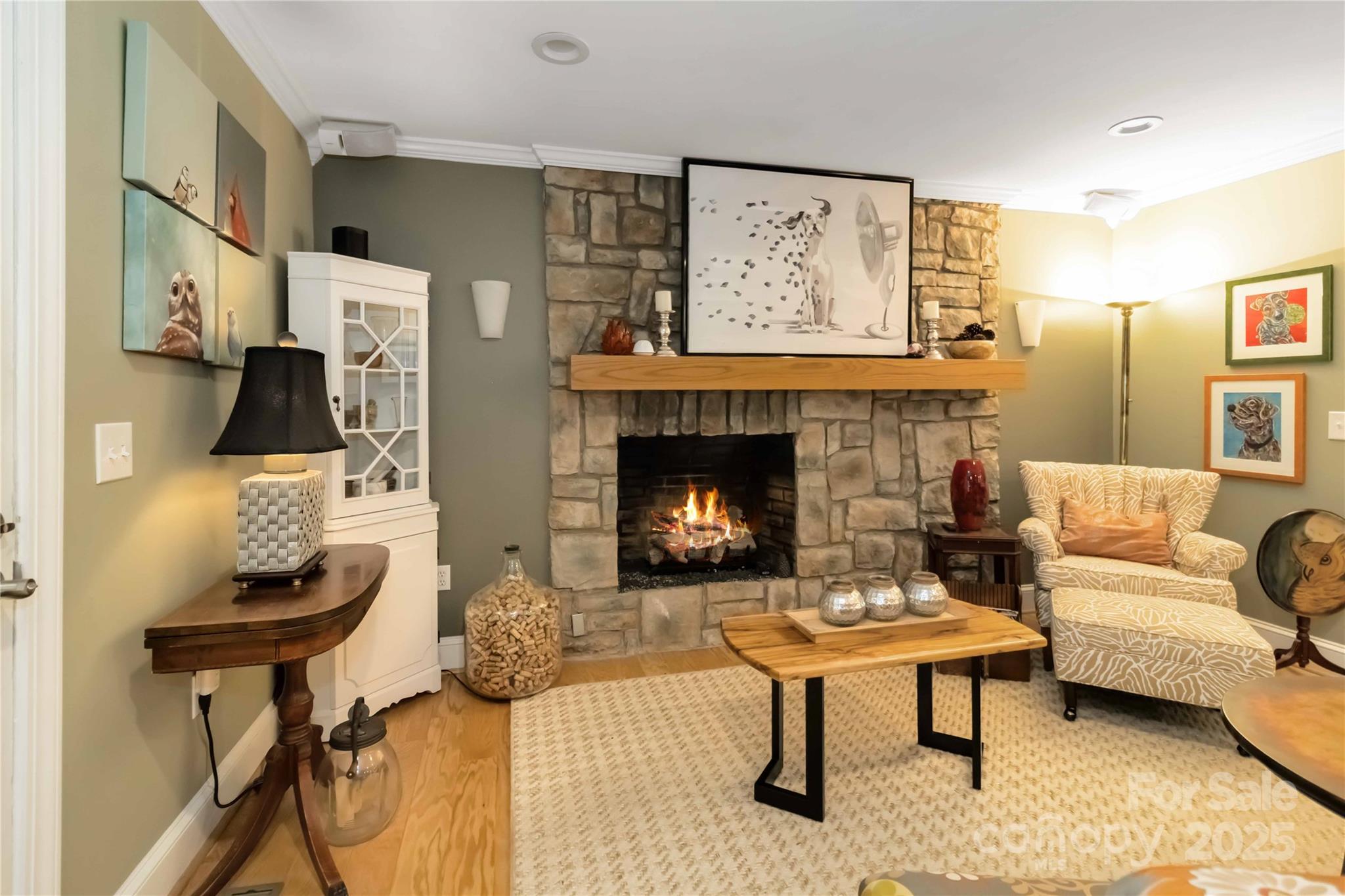 2880 Legion Road Smyrna, SC 29743 - Photo 7 of 48 a living room with furniture and a fireplace