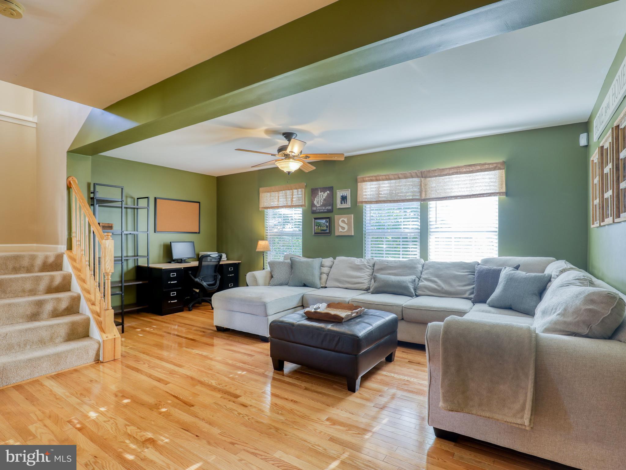 1255 Steed Street Ranson, WV 25438 - Photo 25 of 39 Family room with hardwood floors