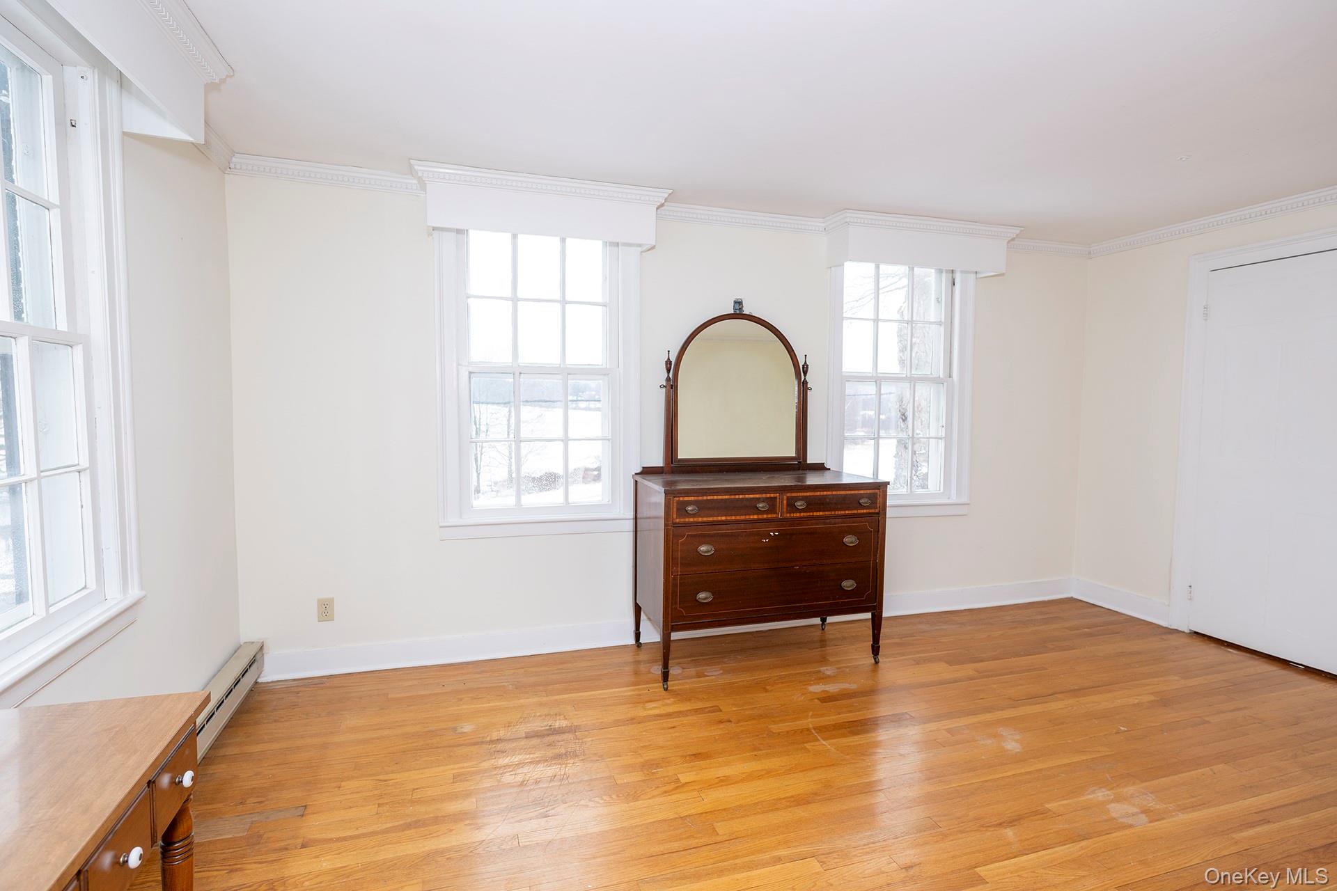79 Camby Road Millbrook, NY 12545 - Photo 24 of 34 a view of room with window and wooden floor