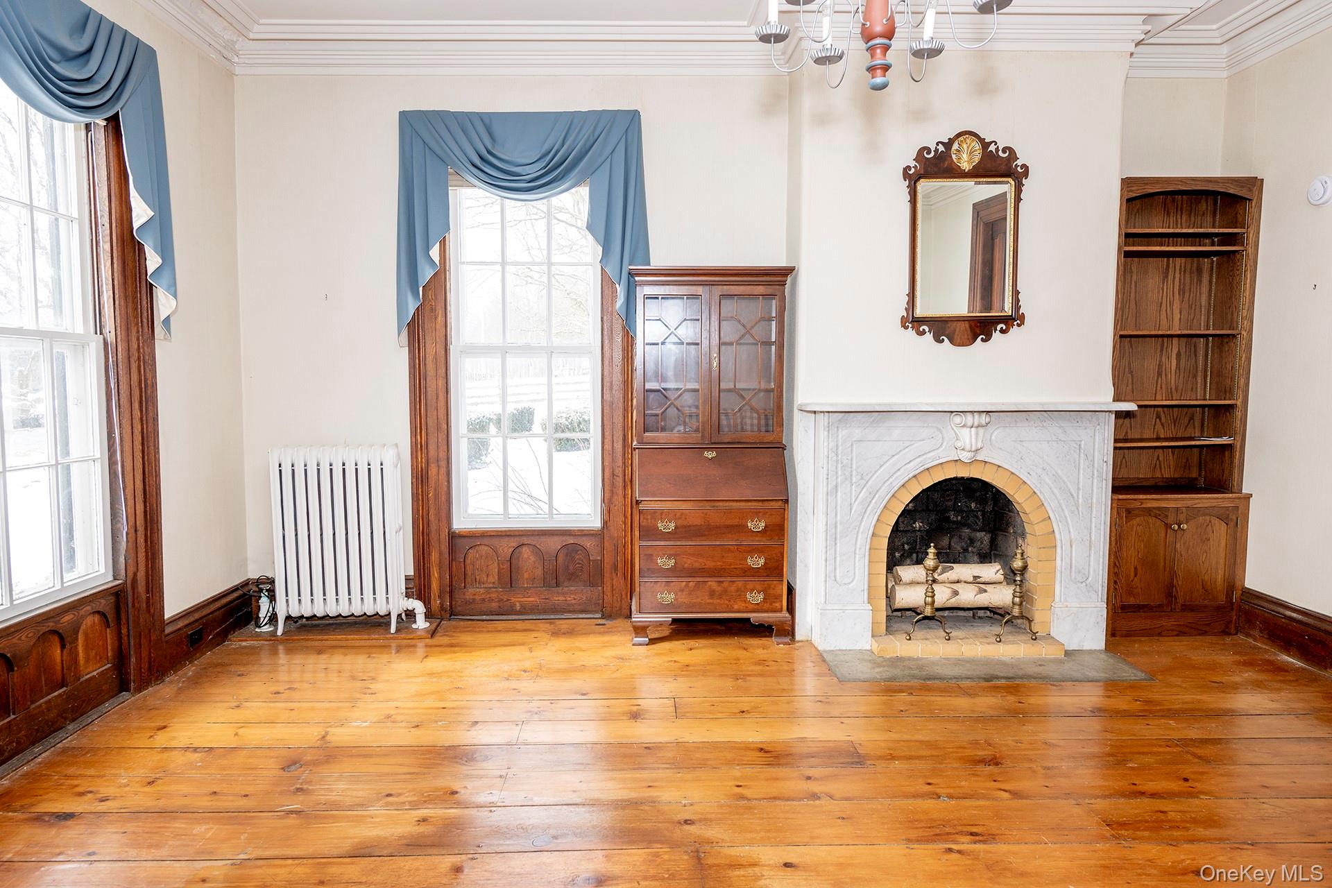 79 Camby Road Millbrook, NY 12545 - Photo 9 of 34 a view of a livingroom with a fireplace and window