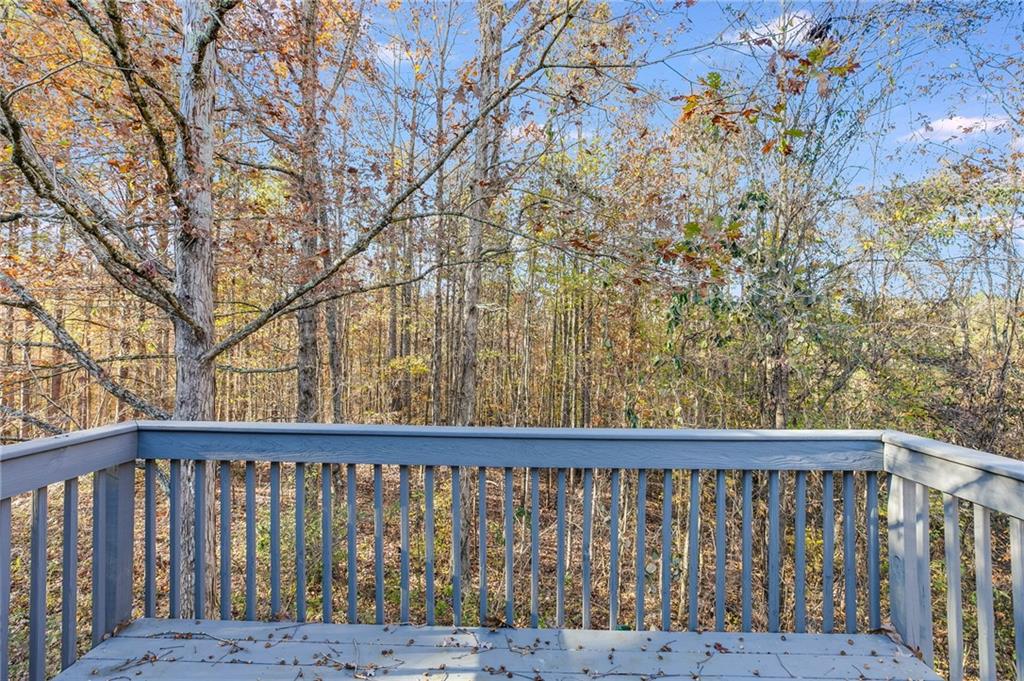 18 Twin Oaks Lane Dallas, GA 30157 - Photo 16 of 24 a balcony with wooden floor and fence