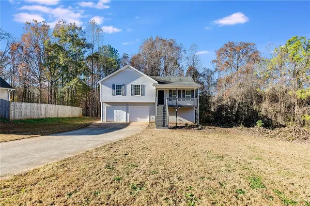 a view of a house with a snow in the background