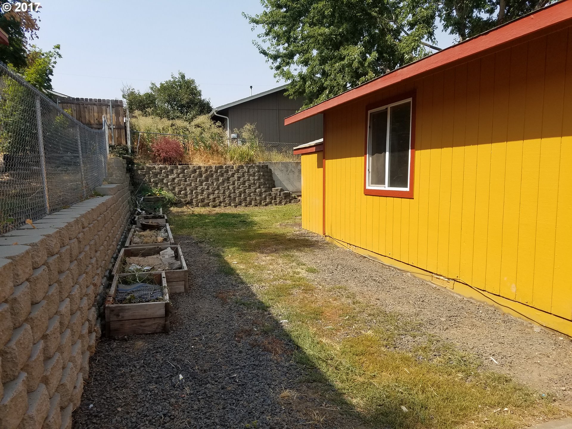 819 Southwest 9th Street Pendleton, OR 97801 - Photo 15 of 20 a view of a backyard with pathway