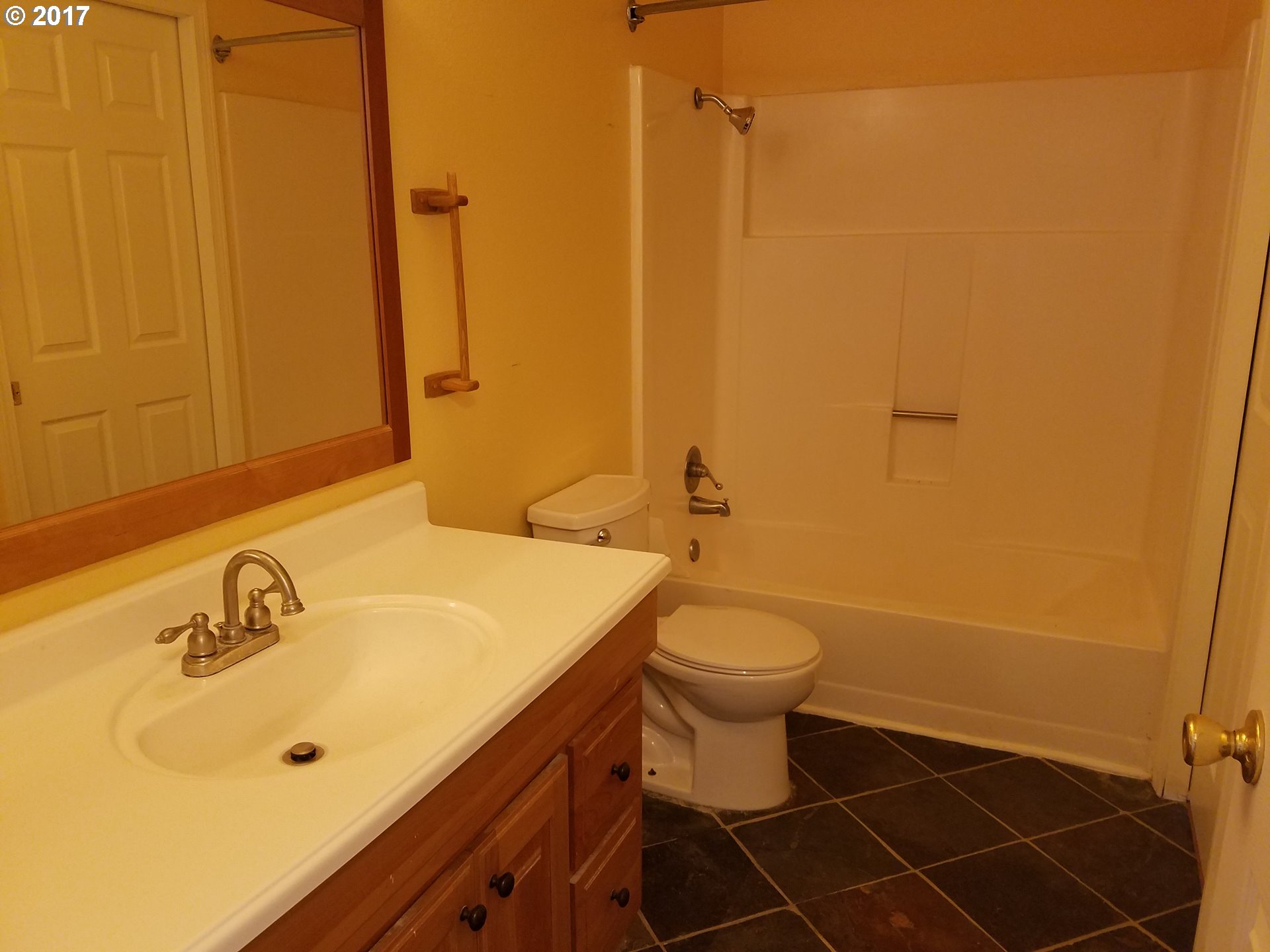 819 Southwest 9th Street Pendleton, OR 97801 - Photo 9 of 20 a bathroom with a sink a toilet and shower