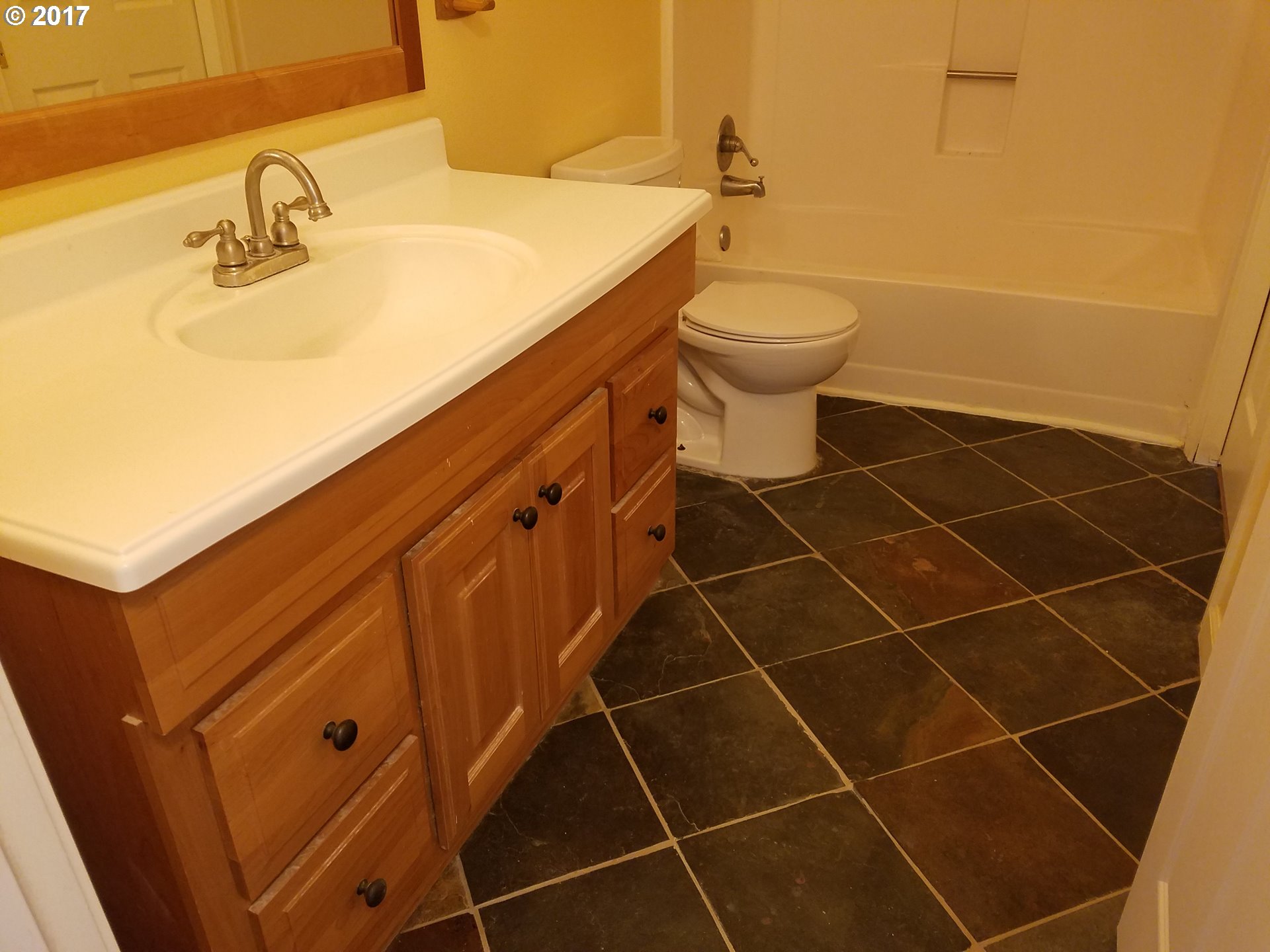 819 Southwest 9th Street Pendleton, OR 97801 - Photo 10 of 20 a bathroom with a sink toilet and a mirror