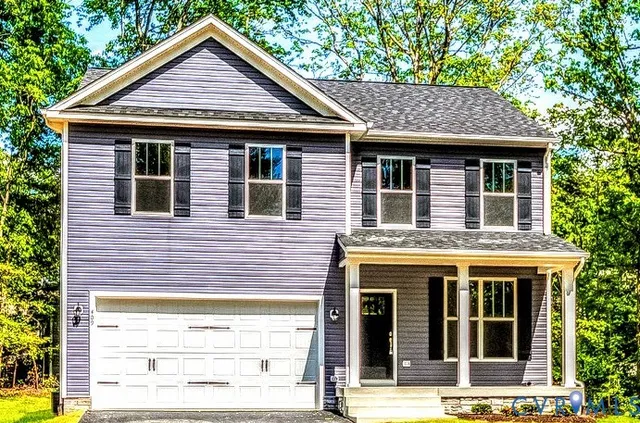 a front view of a house with glass windows