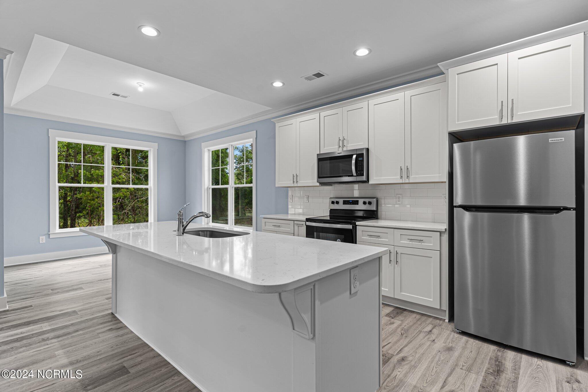 520 Barber Road Southport, NC 28461 - Photo 13 of 34 Island and Trey ceiling