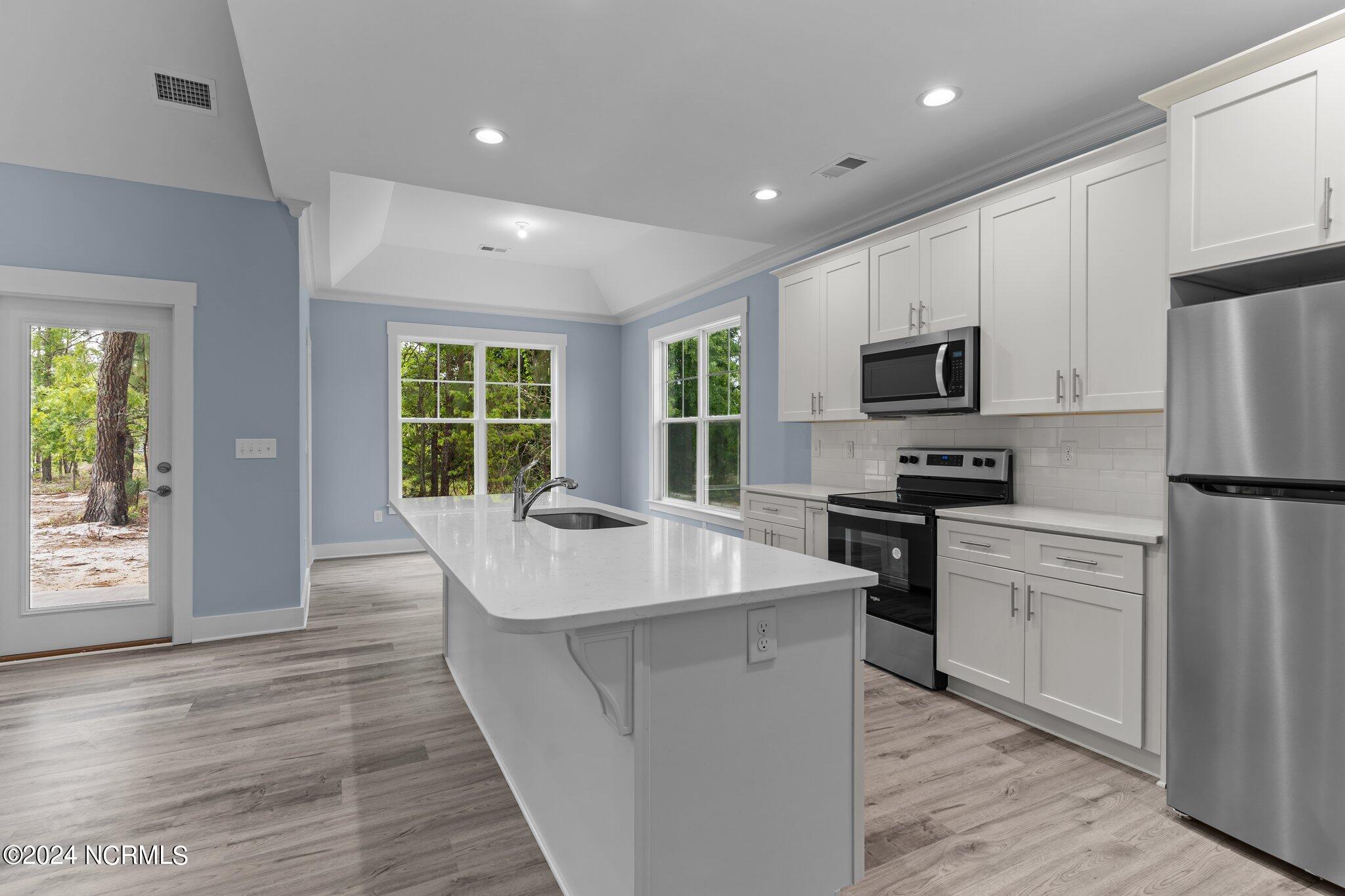 520 Barber Road Southport, NC 28461 - Photo 16 of 34 Island and Trey ceiling
