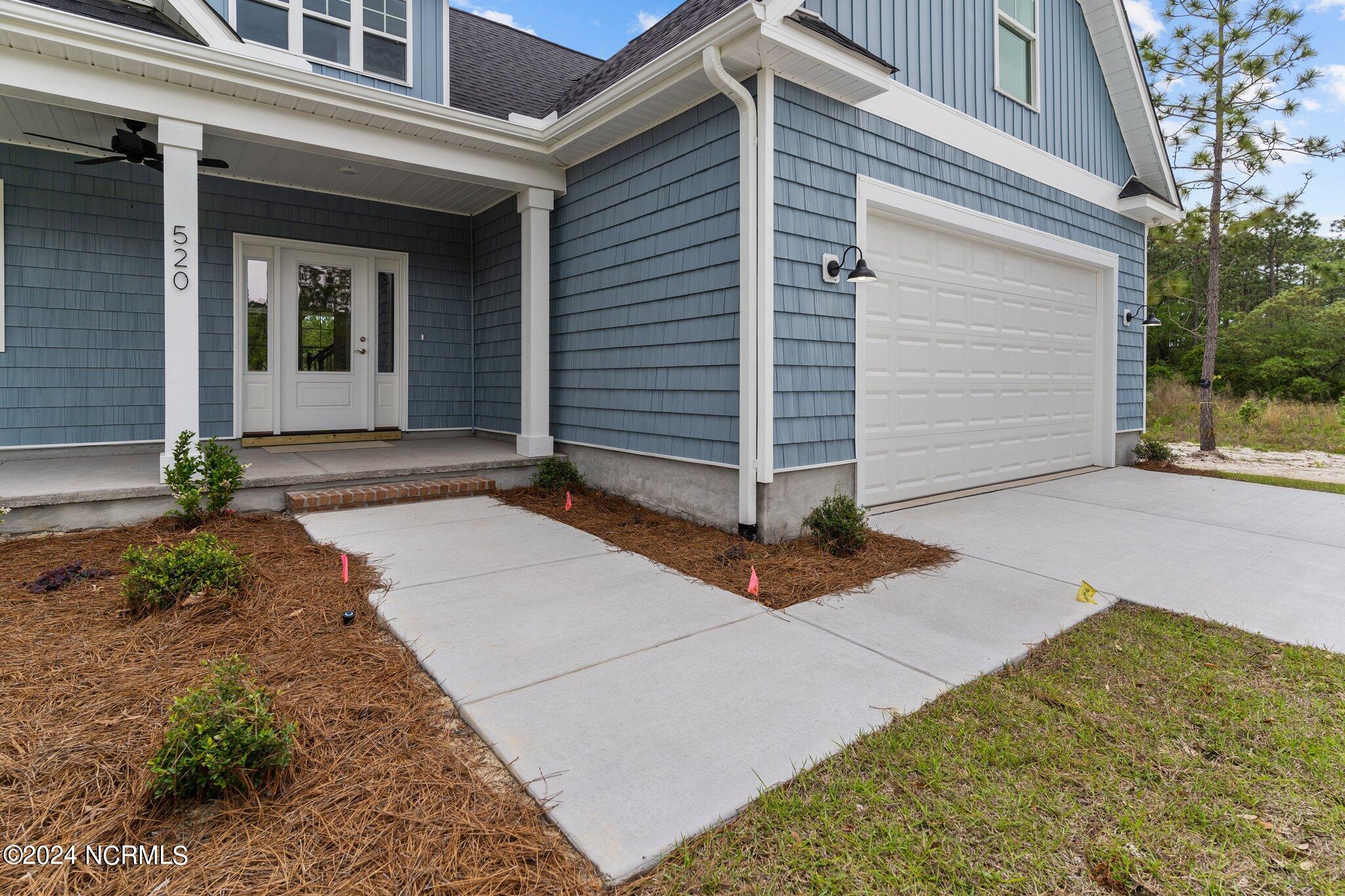 520 Barber Road Southport, NC 28461 - Photo 26 of 34 Sod and irrigation