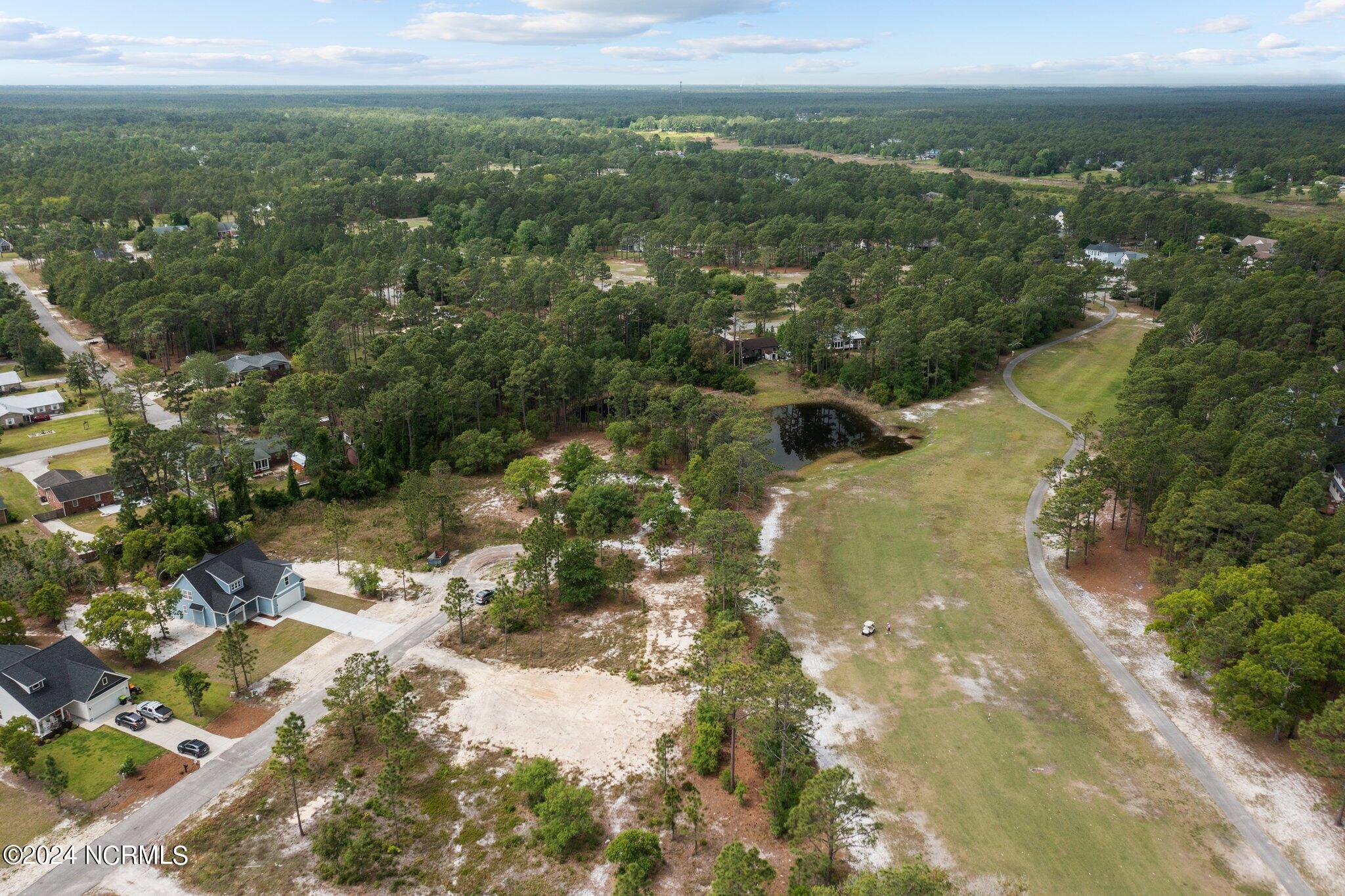 520 Barber Road Southport, NC 28461 - Photo 33 of 34 Culdesac lot across from golf course