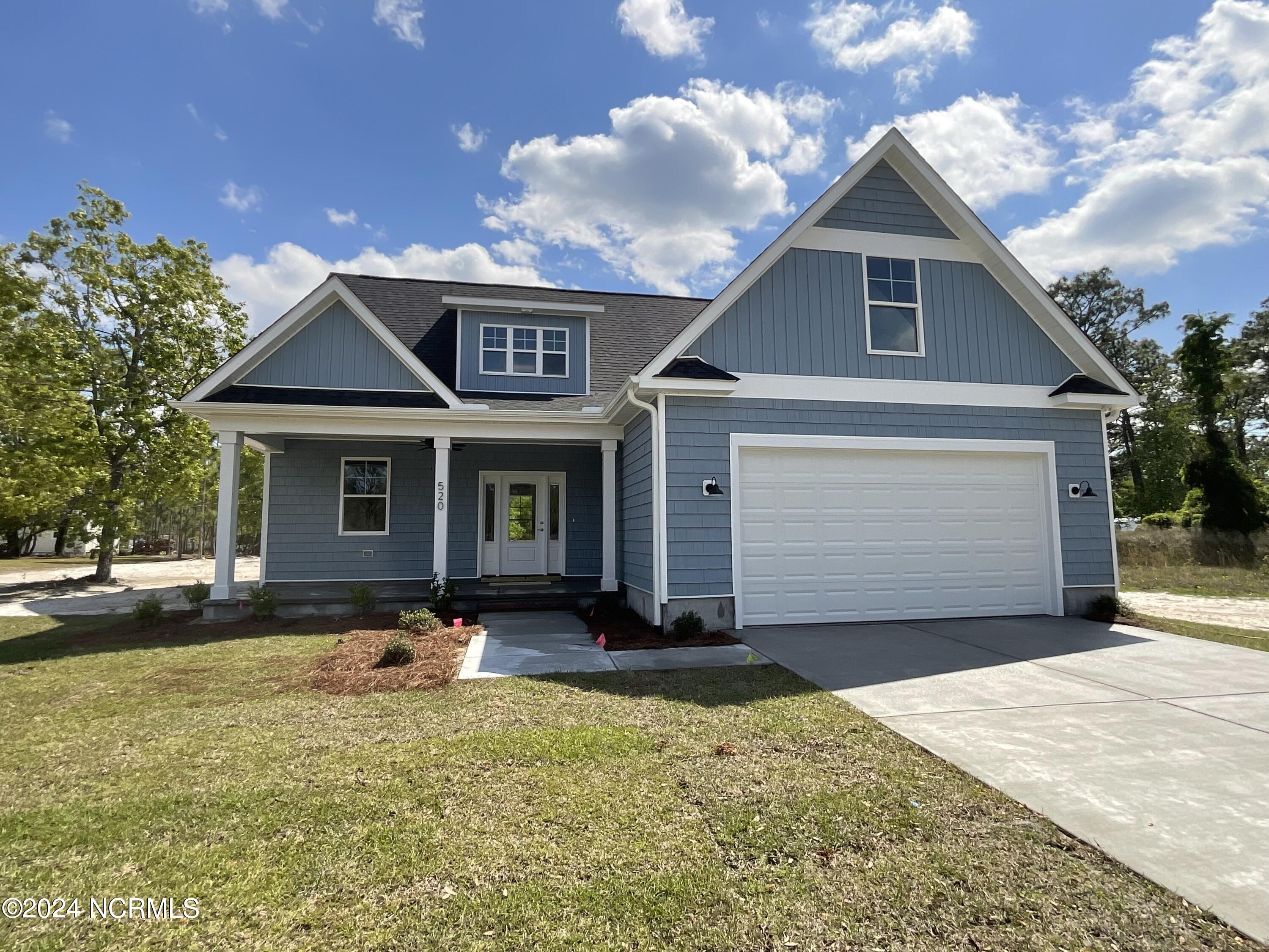 520 Barber Road Southport, NC 28461 - Photo 4 of 34 Plenty of Parking with this long concrete driveway!