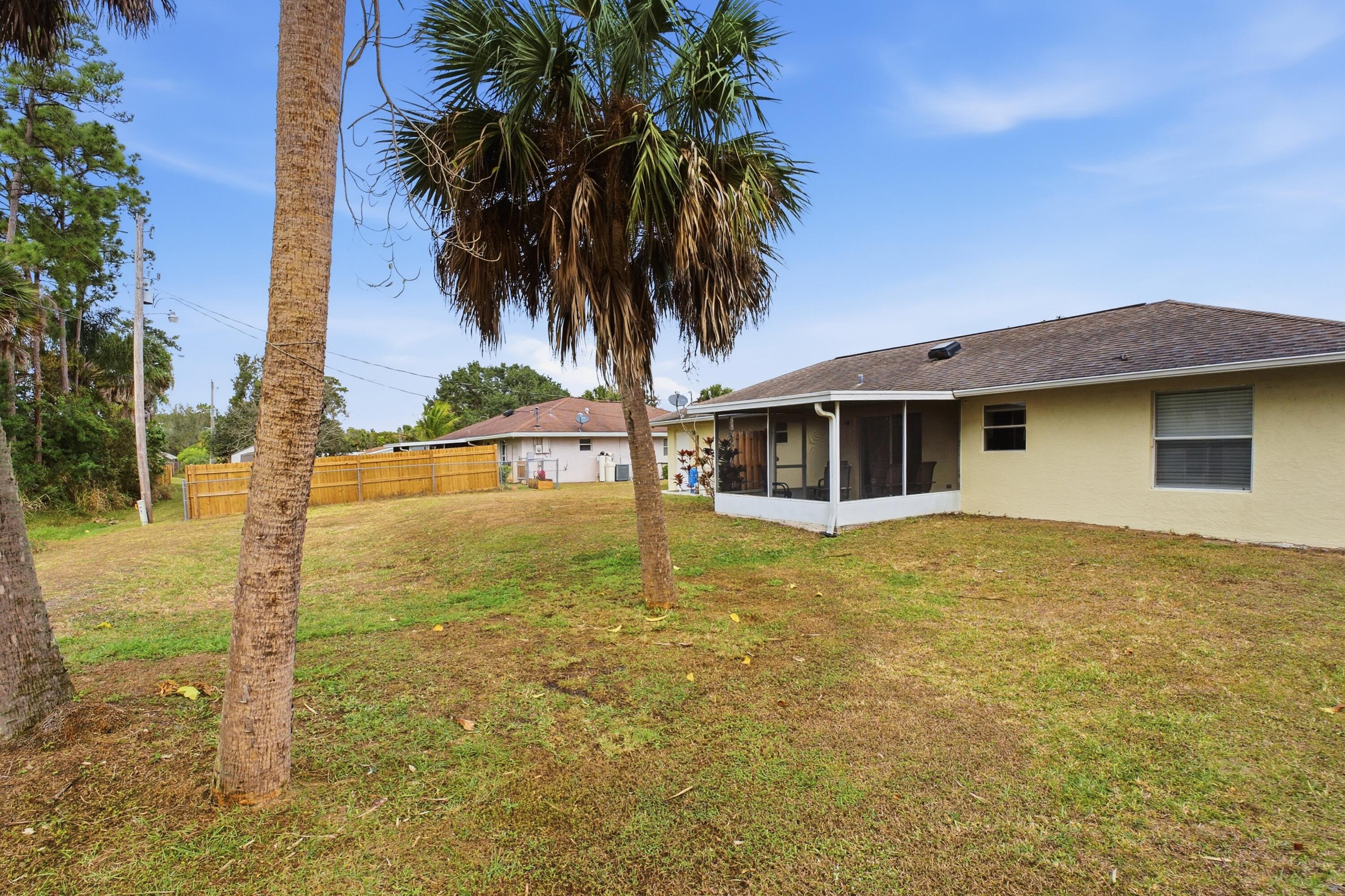 5809 Killarney Avenue Fort Pierce, FL 34951 - Photo 24 of 29 a view of a house with a yard