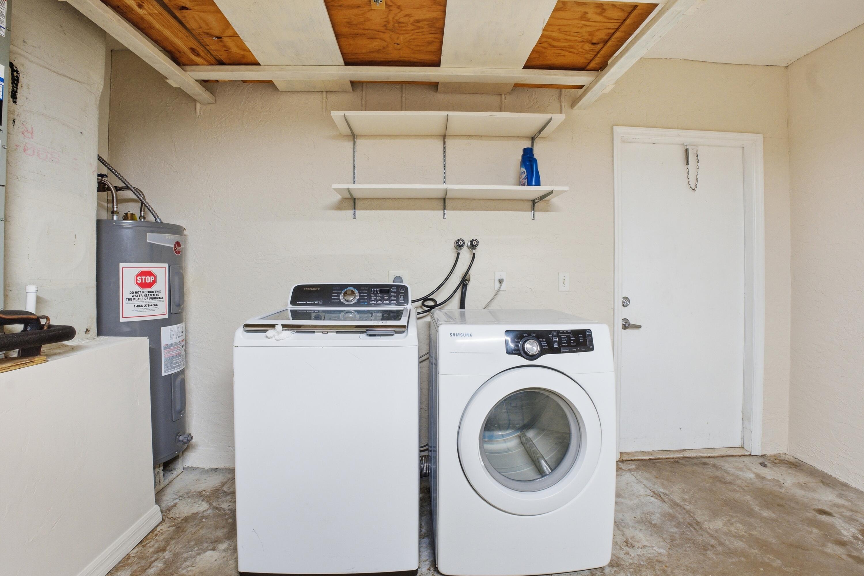 5809 Killarney Avenue Fort Pierce, FL 34951 - Photo 28 of 29 a utility room with dryer and washer