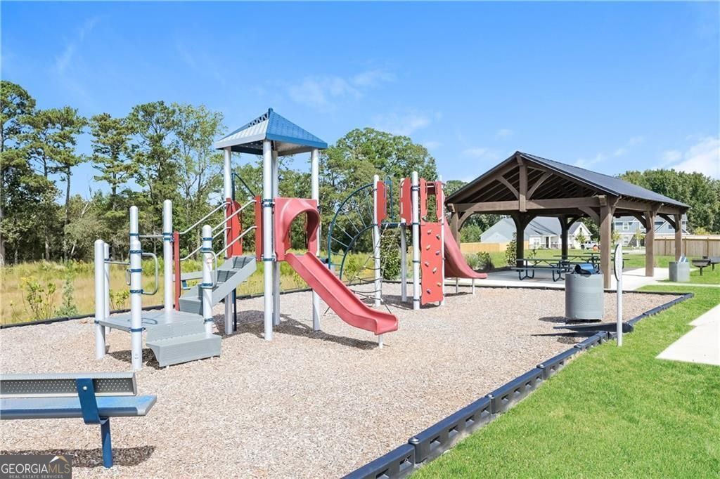 3323 Arabian Farm Lane Dacula, GA 30019 - Photo 19 of 24 a view of a park with slide