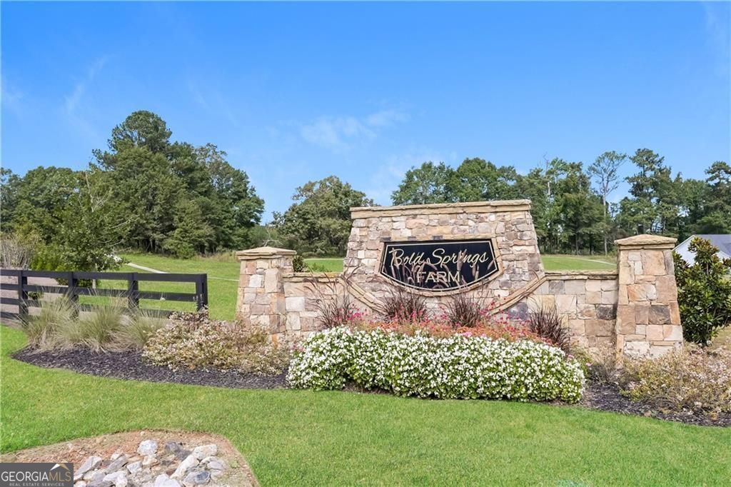3323 Arabian Farm Lane Dacula, GA 30019 - Photo 20 of 24 a view of a park with a bench in the background