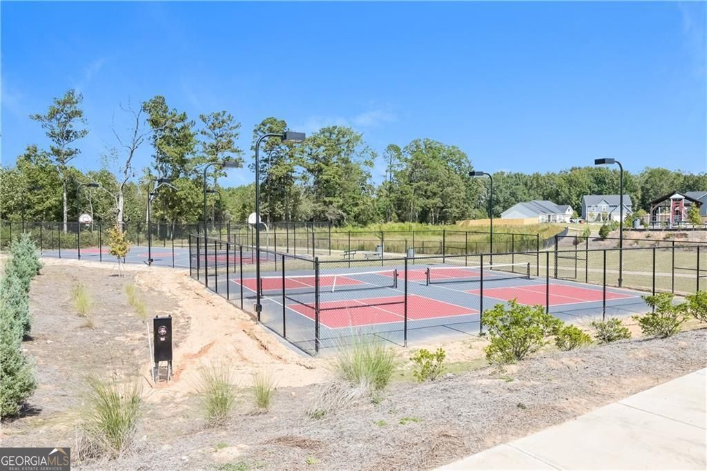 3323 Arabian Farm Lane Dacula, GA 30019 - Photo 21 of 24 a view of a park with iron fence