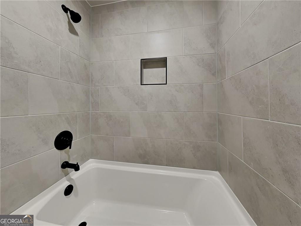 3323 Arabian Farm Lane Dacula, GA 30019 - Photo 9 of 24 a bathroom with a shower