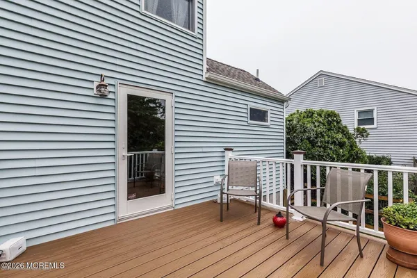 a view of a deck with wooden floor and a wooden floor