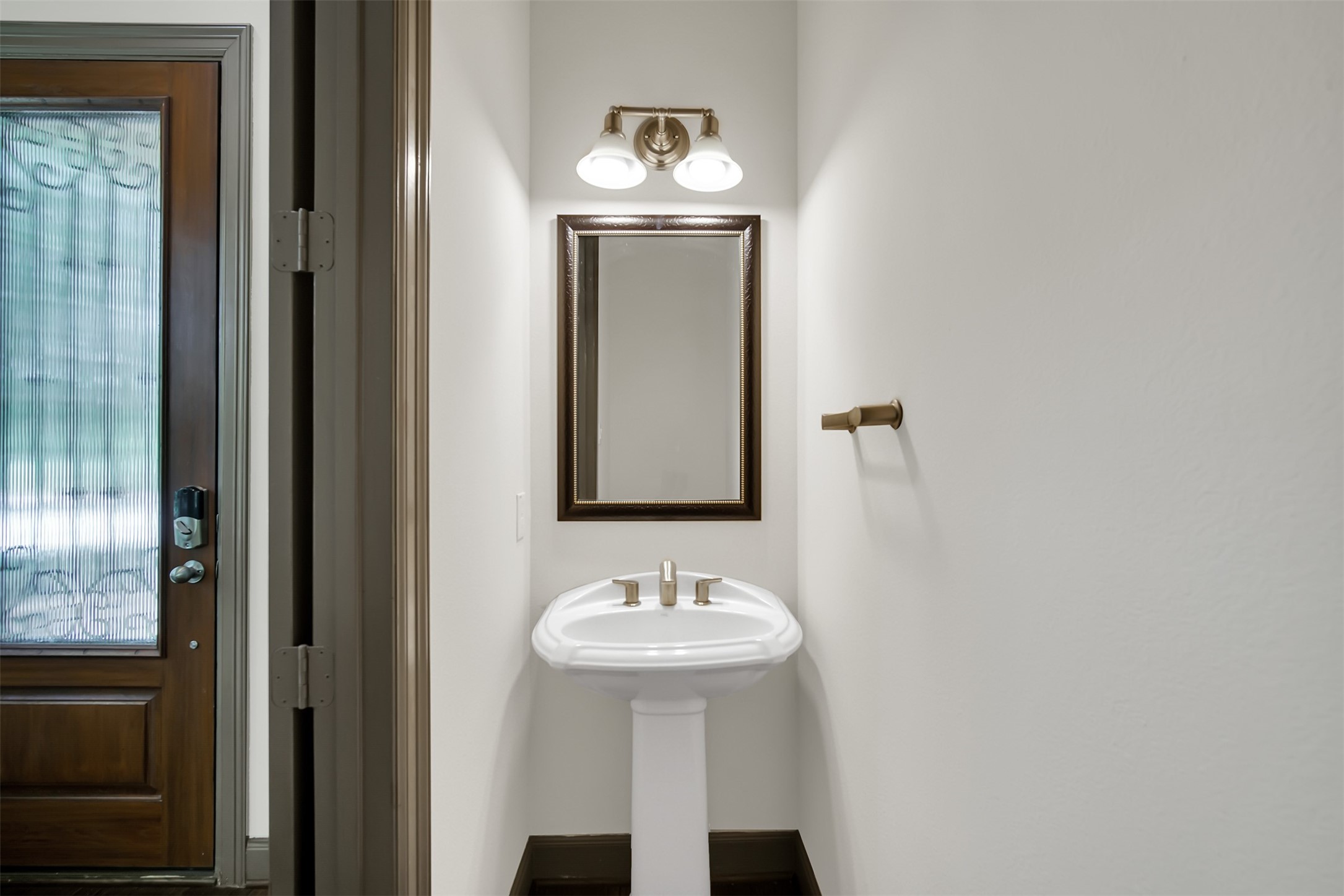 111 Aventura Place Spring, TX 77389 - Photo 5 of 42 a bathroom with a sink and a mirror