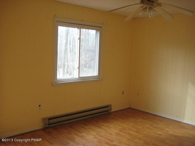6216 Decker Road Bushkill, PA 18324 - Photo 7 of 8 an empty room with a window