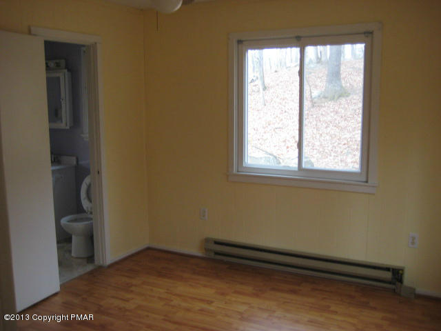 6216 Decker Road Bushkill, PA 18324 - Photo 8 of 8 a view of an empty room and window