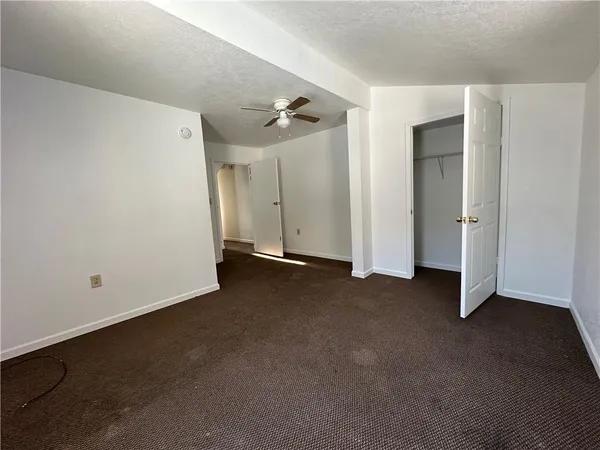 an empty room with closet