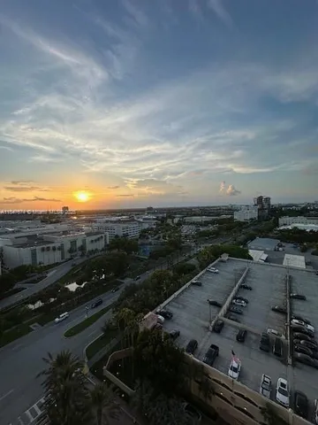 a view of a balcony filled with furniture